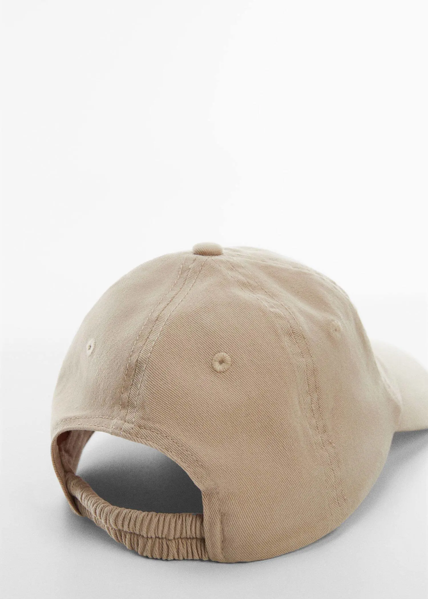 Mango Organic cotton cap. a close-up of the back of a baseball cap. 
