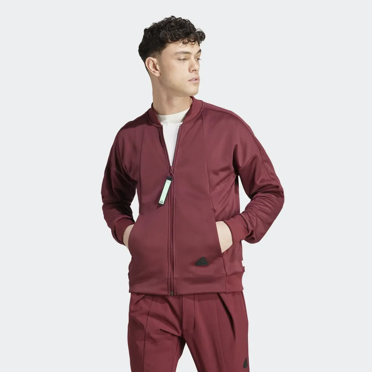 Adidas City Escape AEROREADY Warming Track Top. 2