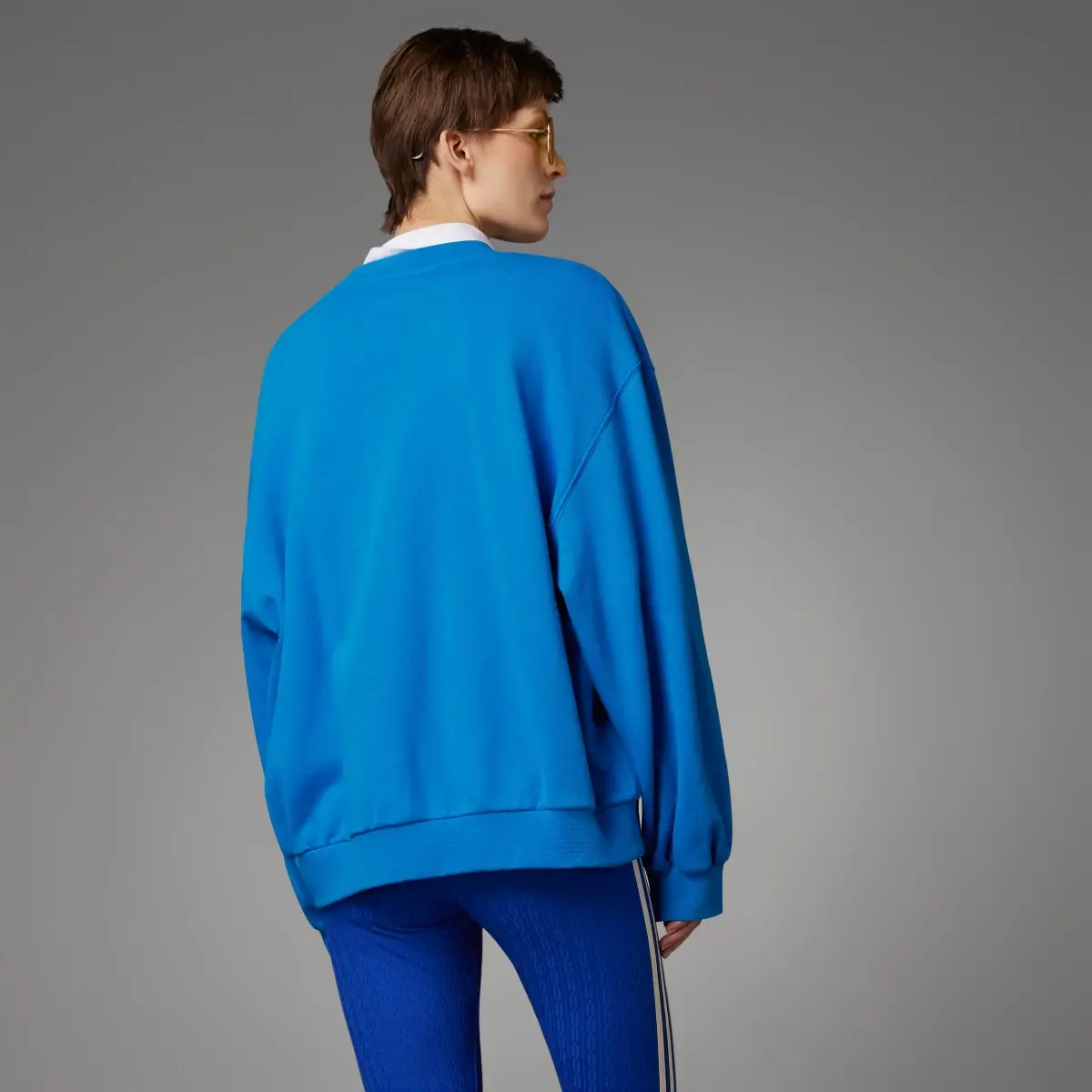 Adidas adicolor 70s 3-Streifen Sweatshirt. 2