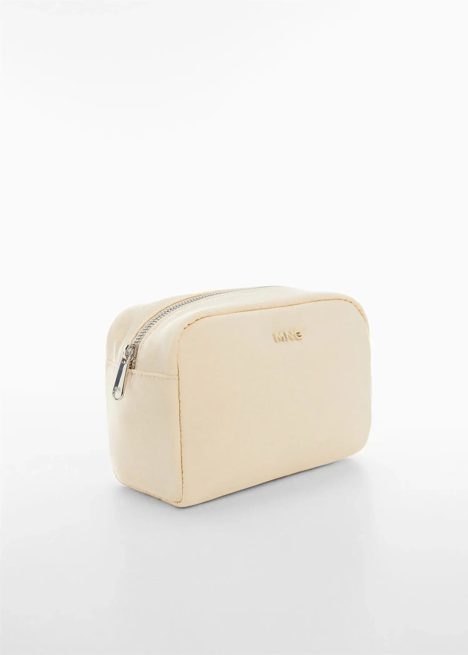 Mango Zippered toiletry bag with logo. a white bag sitting on top of a white table. 