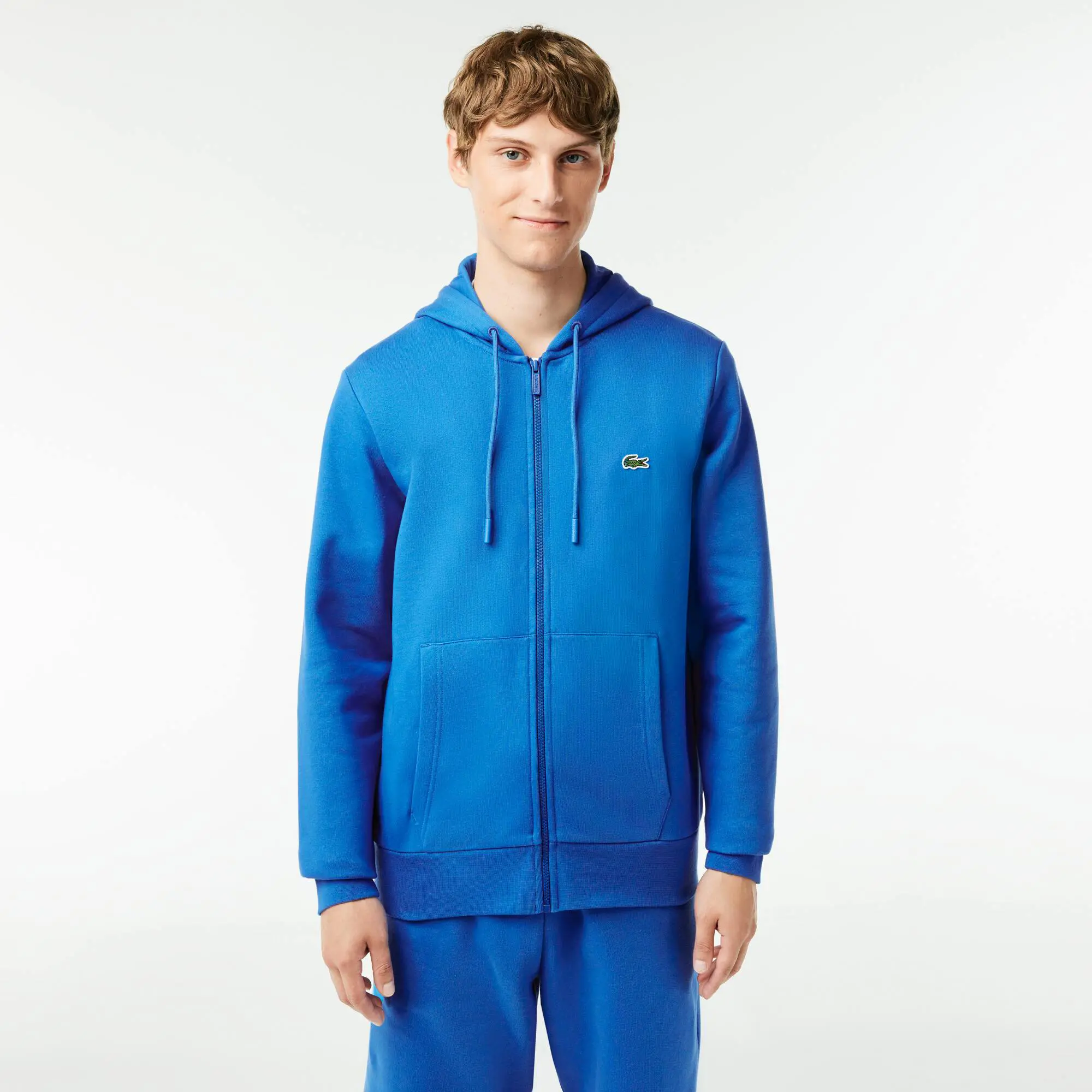 Lacoste Sweatshirt Jogger zippé homme en molleton Lacoste avec poche kangourou. 1