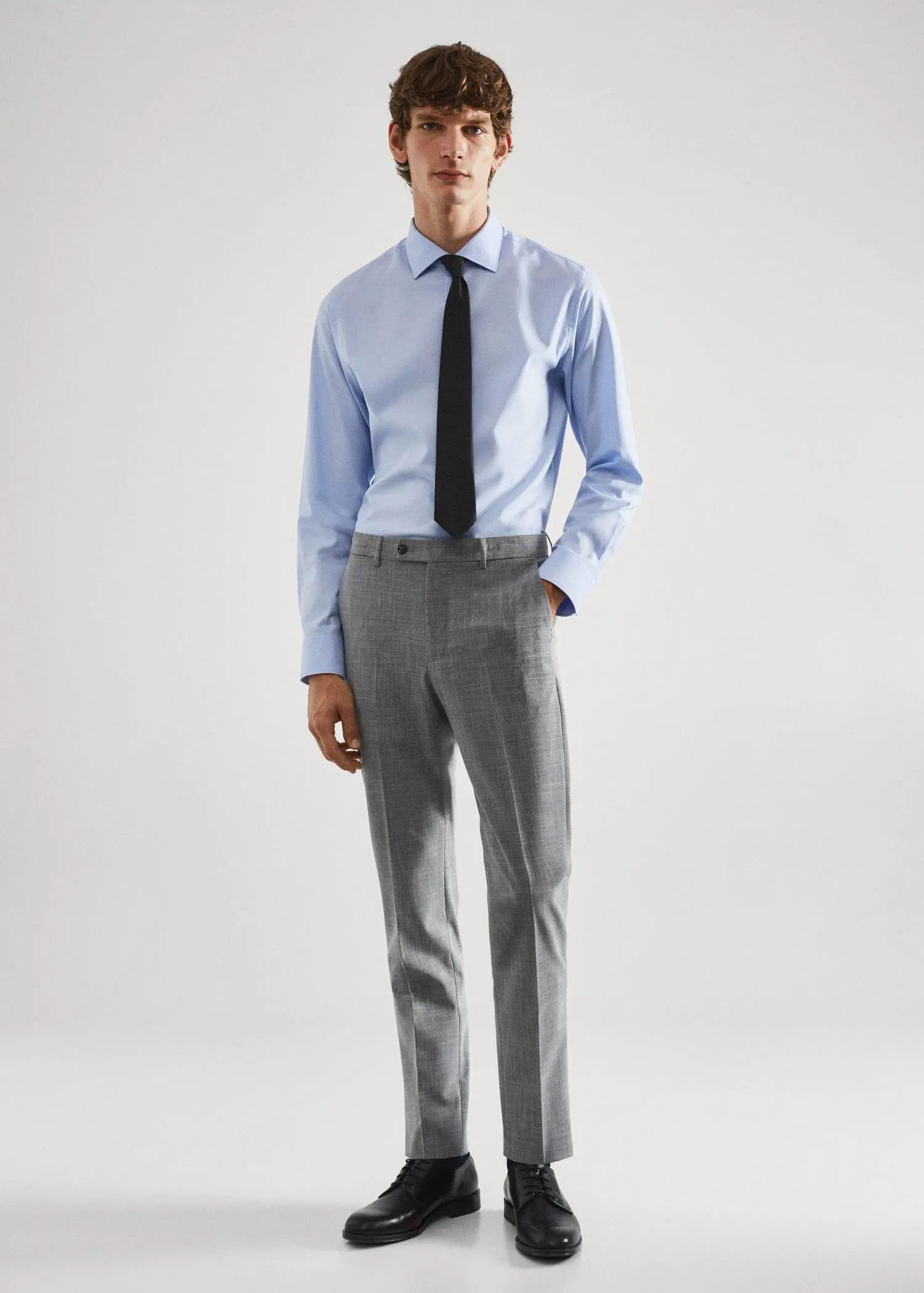 Mango Stretch fabric slim-fit printed suit pants. a man in a dress shirt and tie. 