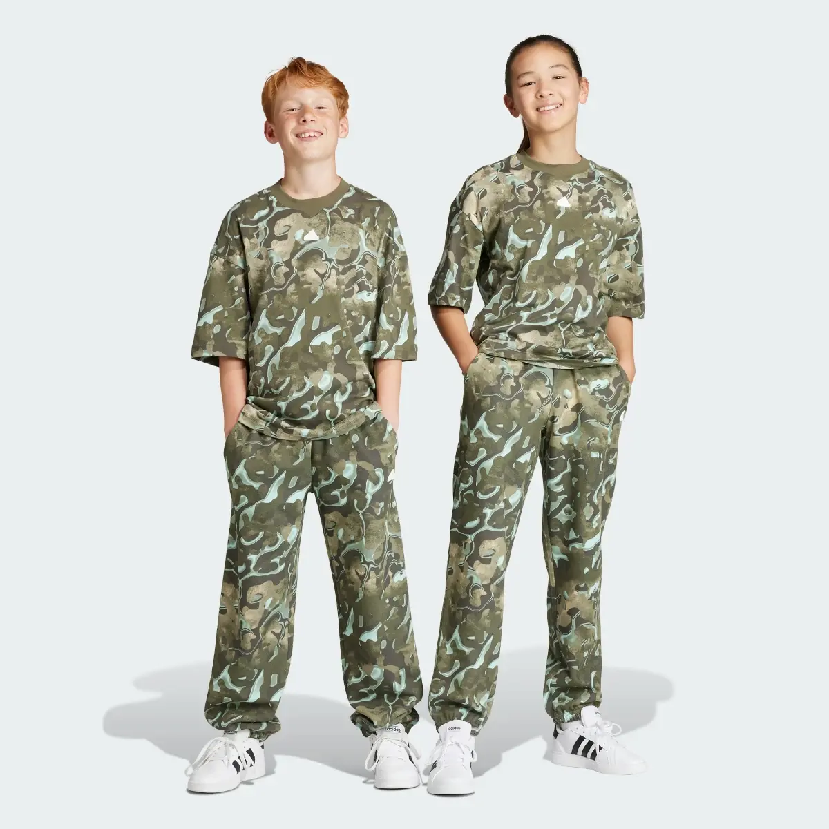 Adidas Pantaloni Future Icons Allover Print Junior. 1