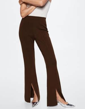 Knitted flared trousers with slits