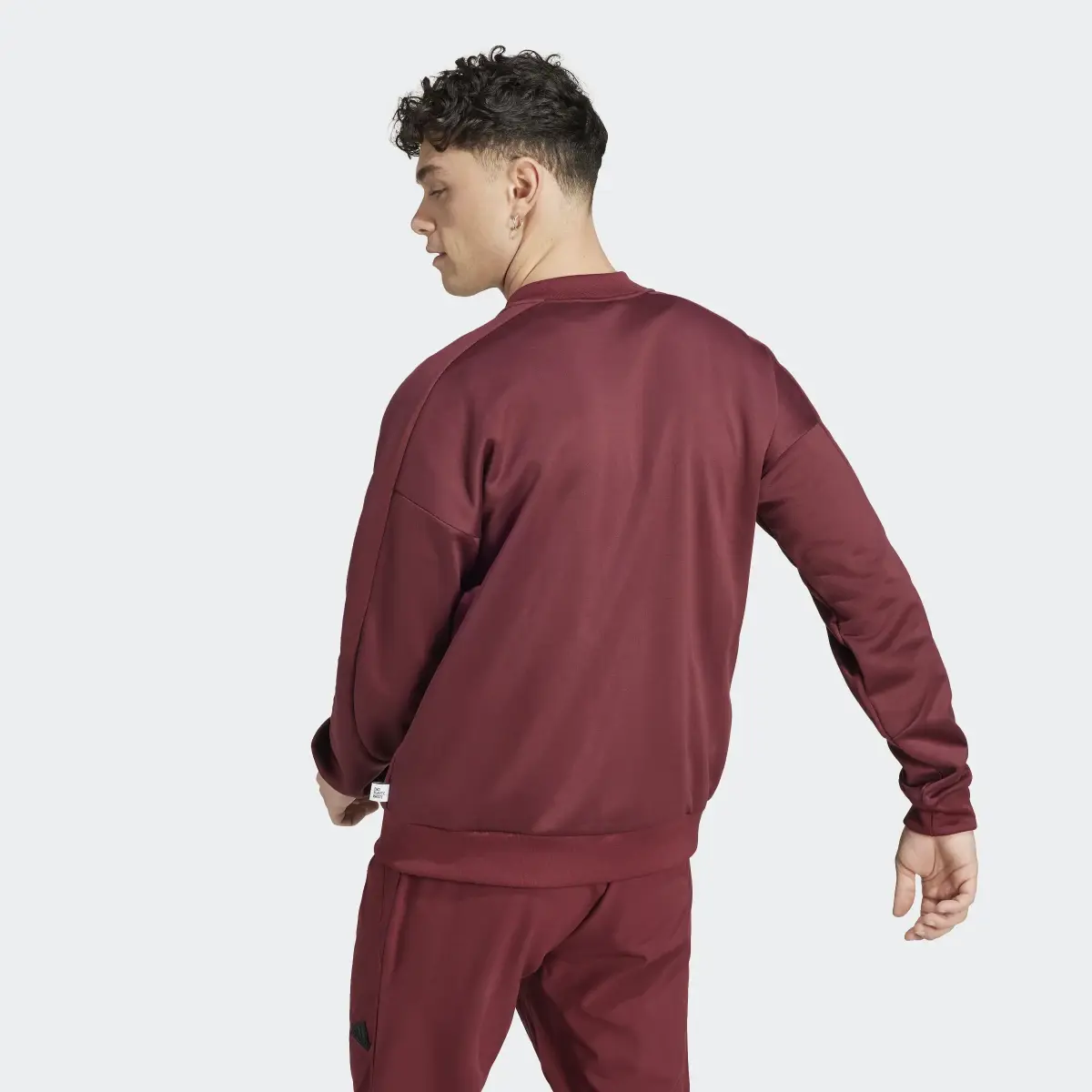 Adidas City Escape AEROREADY Warming Track Top. 3