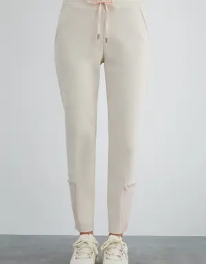 Arka Beli Lastikli Bağ Ucu Taşlı Bej Pantolon