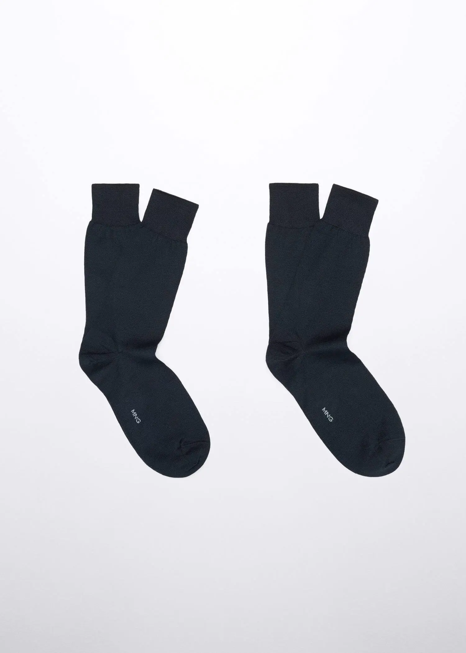 Mango Pack of 2 100% plain cotton socks. a pair of socks that are on the ground. 