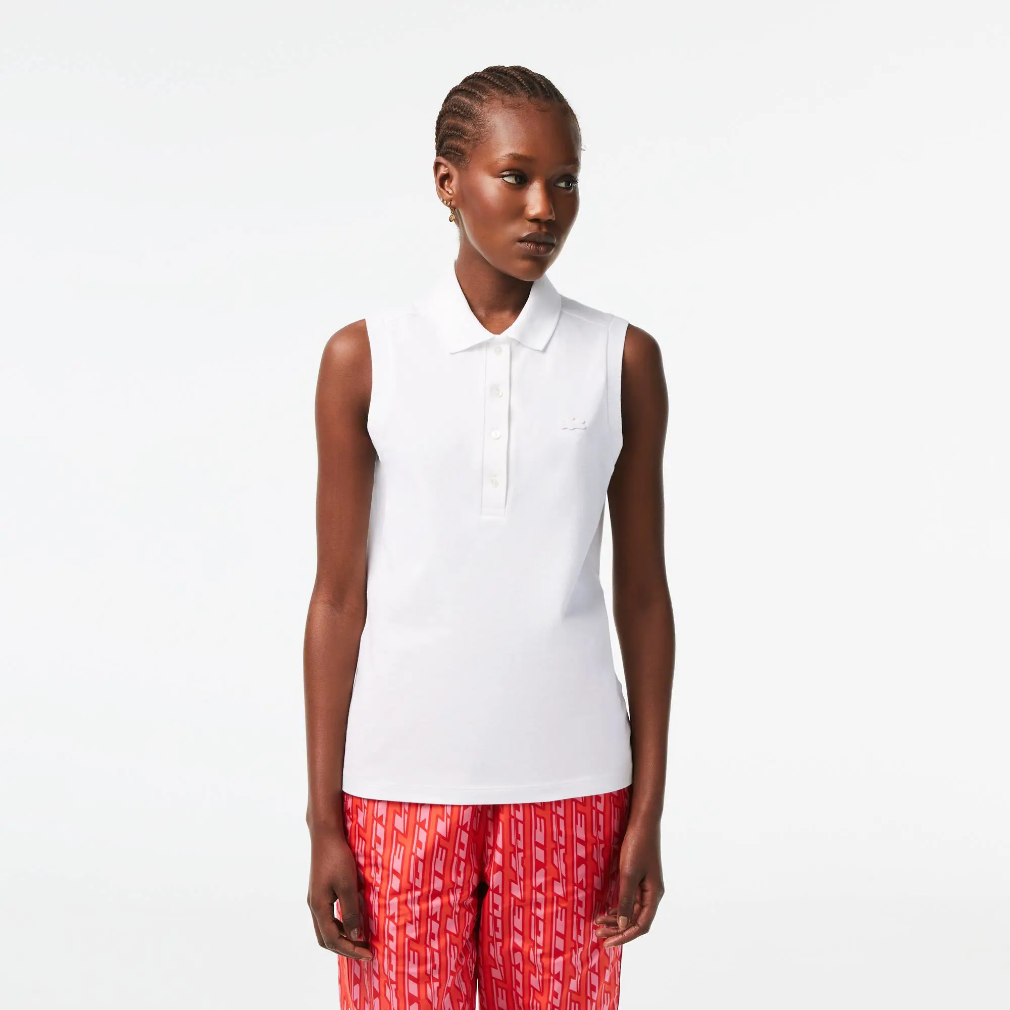 Lacoste Women's Slim Fit Cotton Piqué Sleeveless Polo. 1