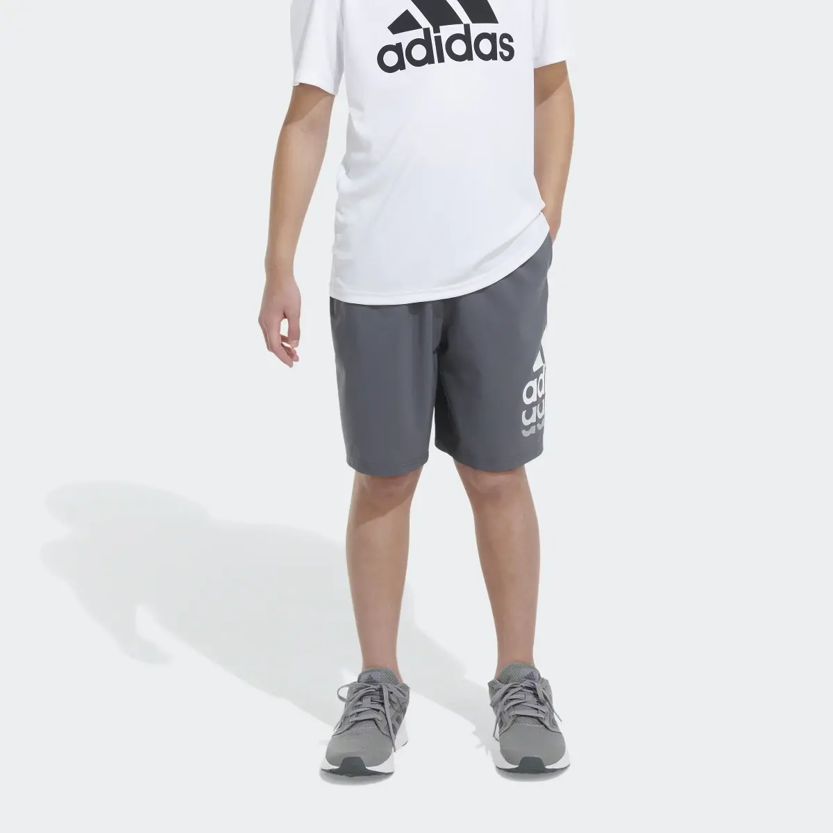 Adidas Essentials Woven Badge of Sport Shorts. 1