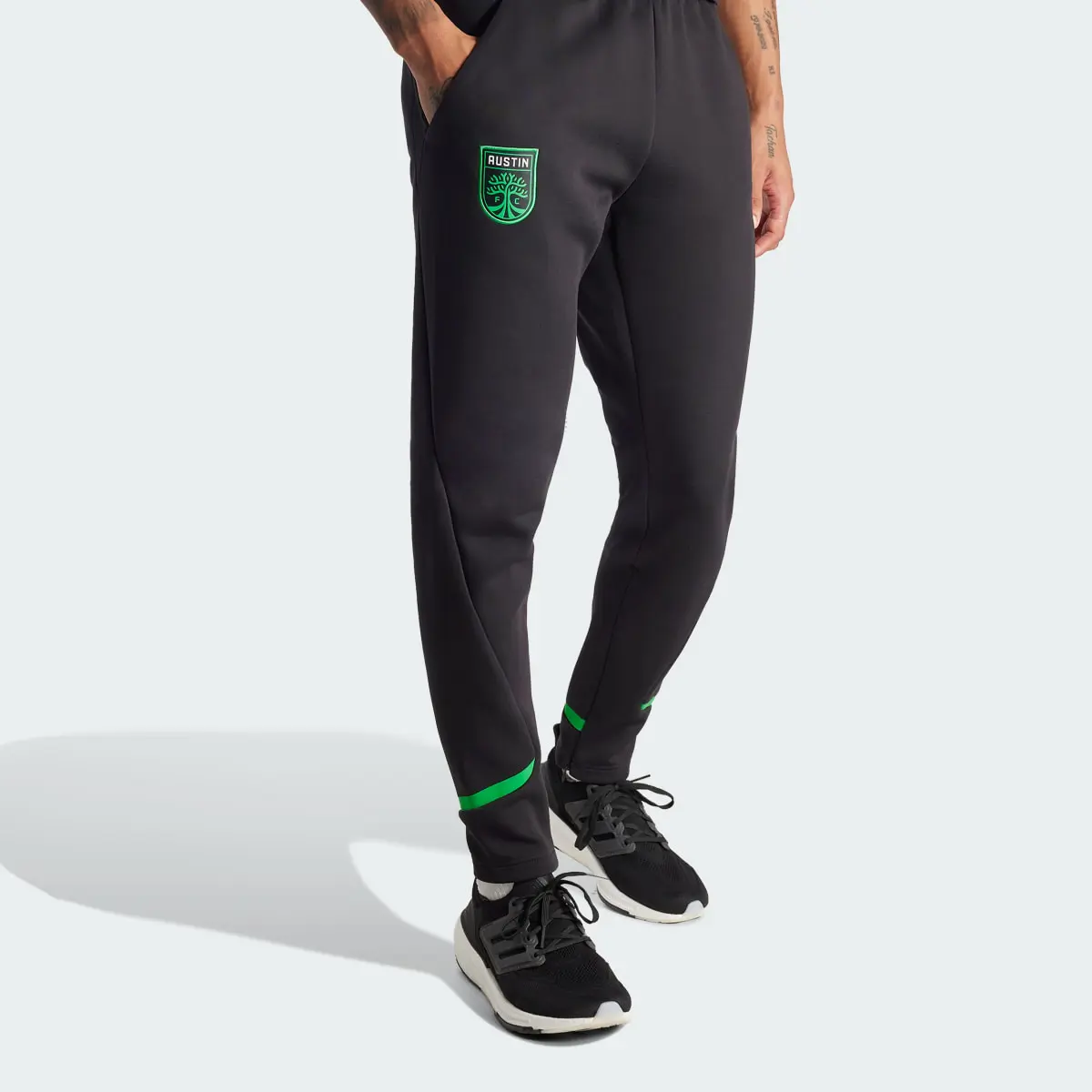 Adidas Austin FC Designed for Gameday Travel Pants. 1