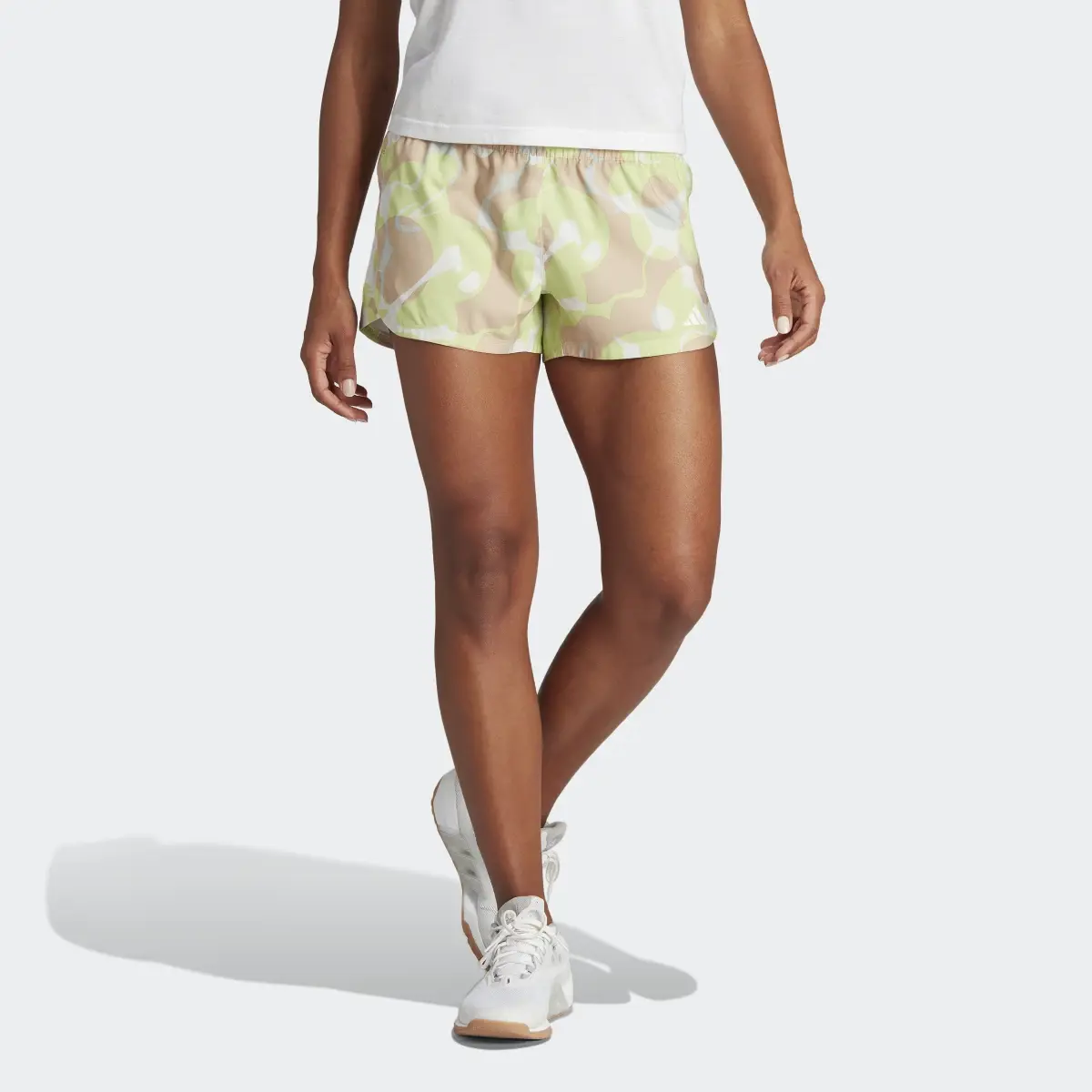 Adidas Pacer Train Essentials Floral-Print Woven Shorts. 1