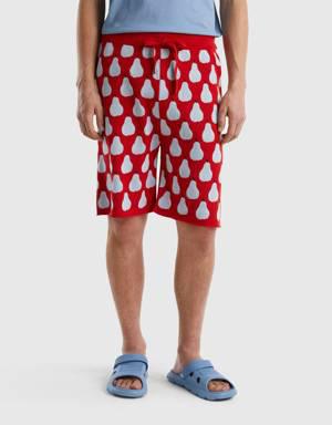 red bermudas with pear pattern