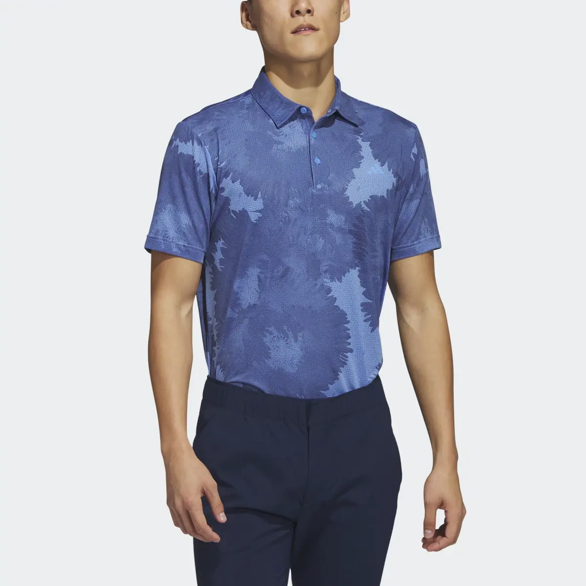 Adidas Polo de golf en mesh Flower. 1