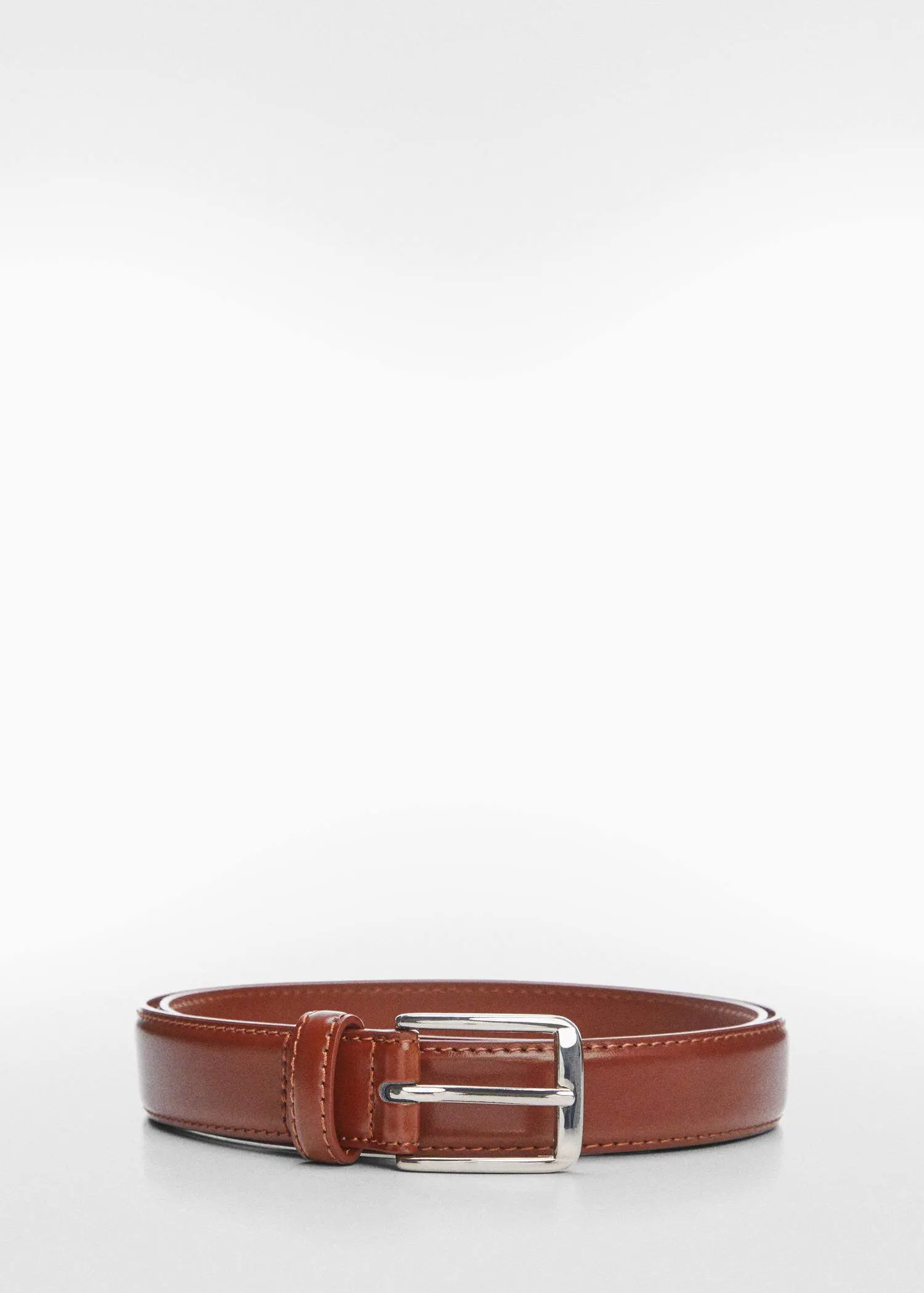 Mango Leather belt. a close up of a belt on a white background 