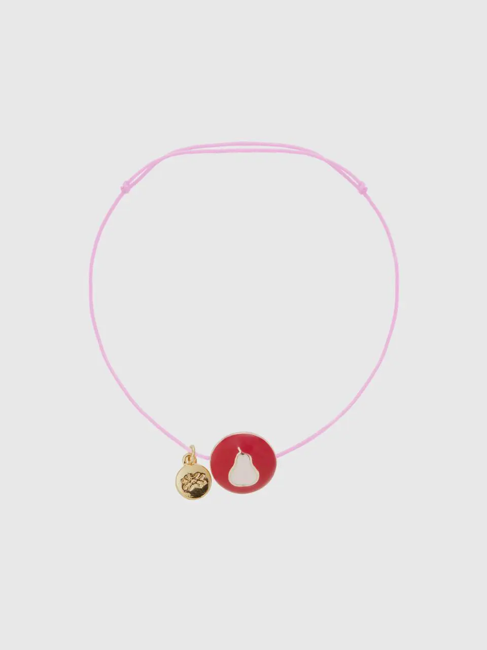 Benetton red bracelet with pear pendant. 1