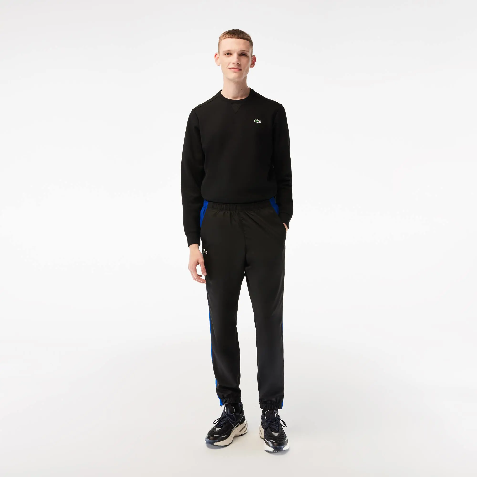 Lacoste Herren LACOSTE Trainingshosen mit Colorblock. 1