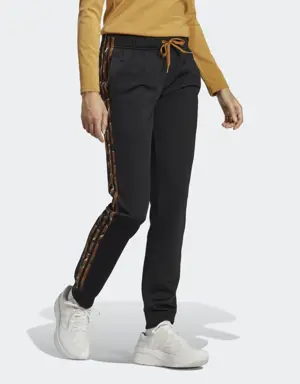 Adidas Primegreen Essentials Warm-Up Slim Tapered 3-Stripes Tracksuit Bottoms. 3 Adidas Primegreen Essentials Warm-Up Slim Tapered 3-Stripes Tracksuit Bottoms. 3