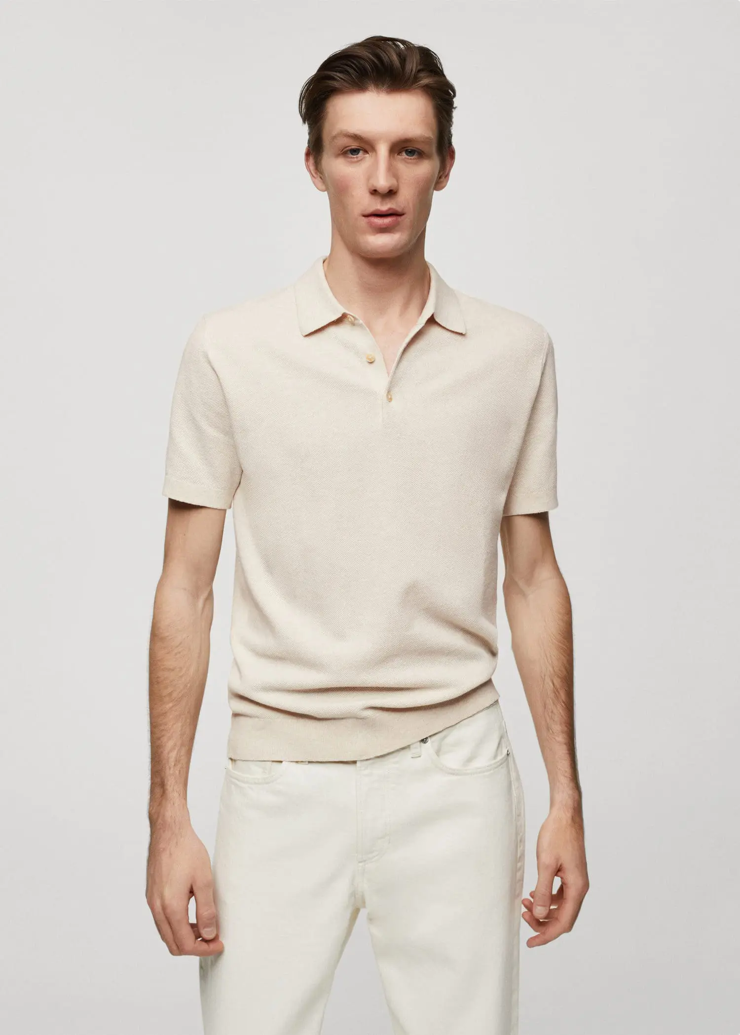 Mango Short-sleeved knitted polo shirt. 1