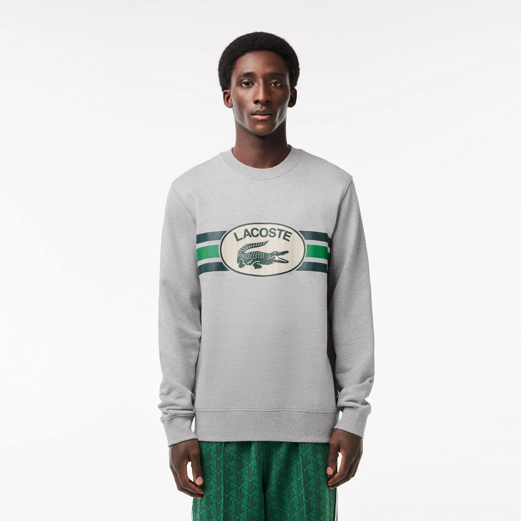 Lacoste Loose Fit Monogram Print Fleece Sweatshirt. 1