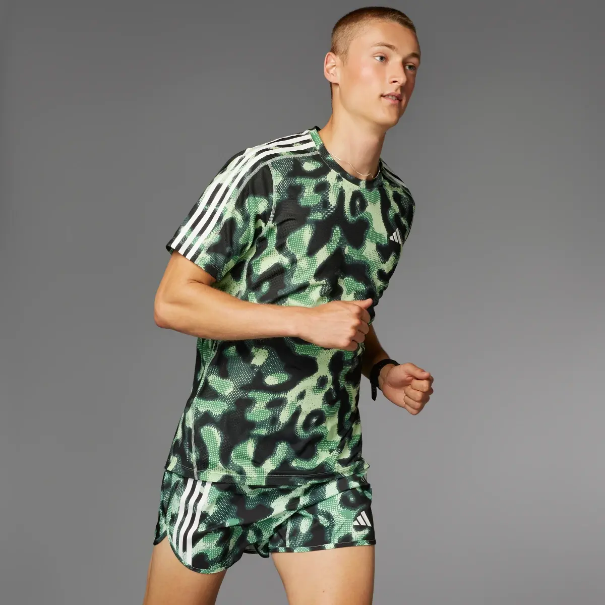 Adidas Own the Run 3-Stripes Allover Print Shorts. 3