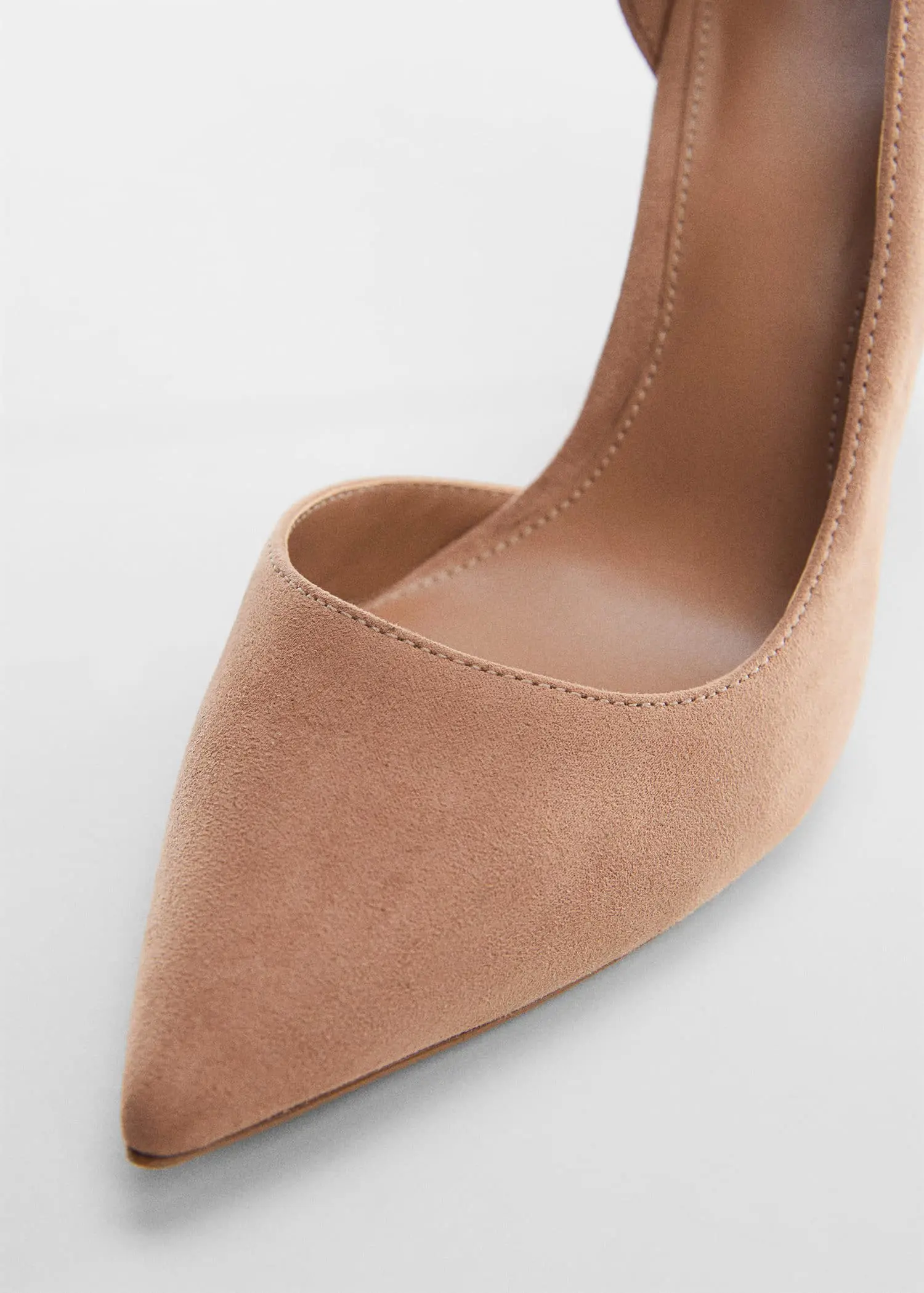 Mango Asymmetrical heeled shoes. a close up view of a pair of shoes. 