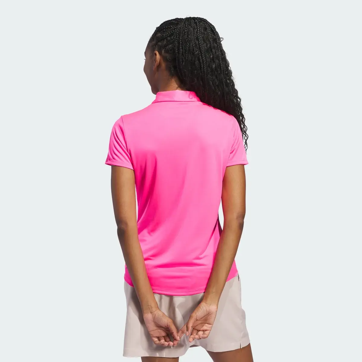 Adidas Women's Solid Performance Short Sleeve Polo Shirt. 1