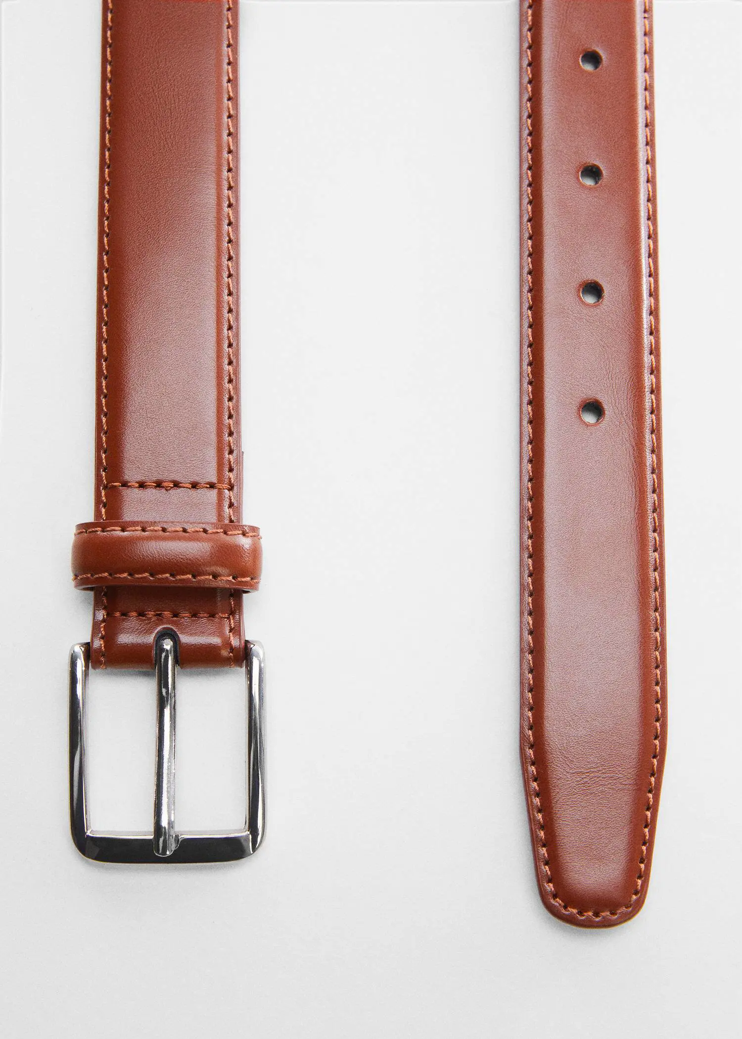 Mango Leather belt. a close up of a brown belt with a silver buckle 