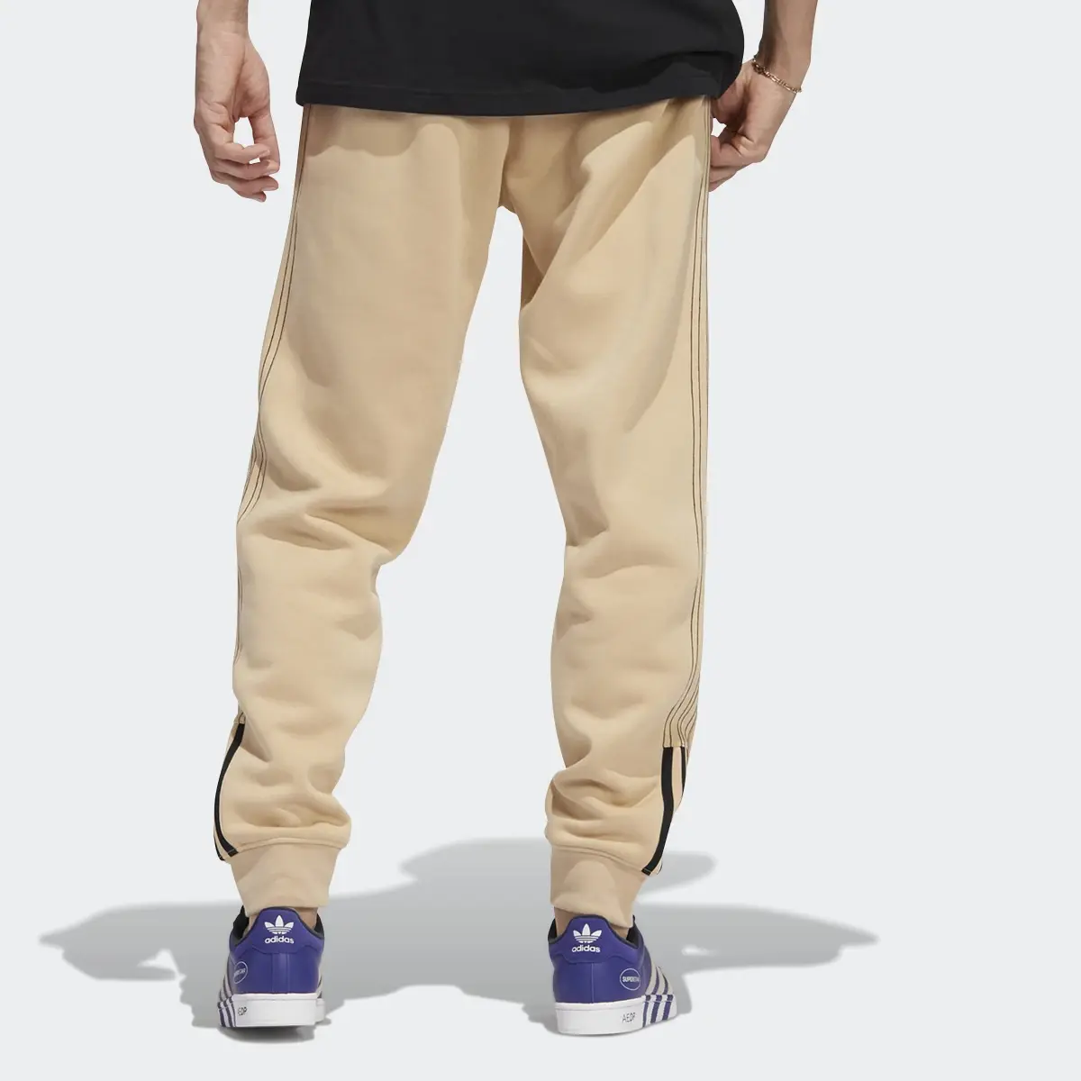 Adidas Fleece SST Track Pants. 2