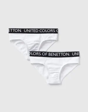 two pairs of underwear with logoed elastic