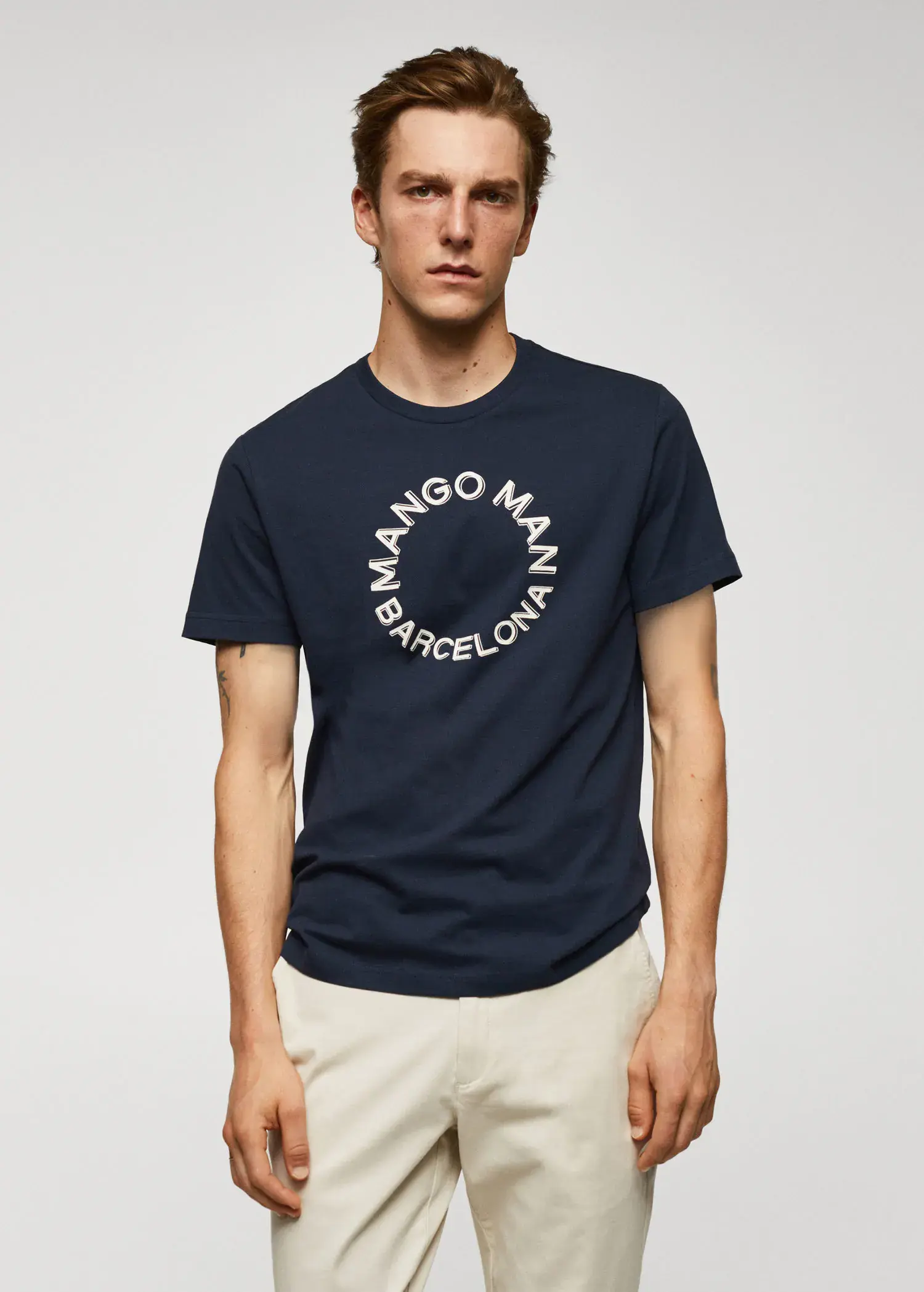 Mango 100% cotton t-shirt with logo. a man wearing a t-shirt that says " mango man barcelona ". 
