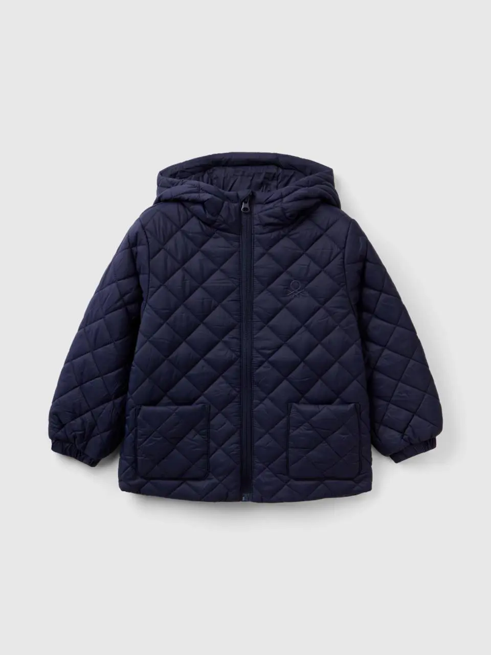 Benetton quilted jacket with hood. 1