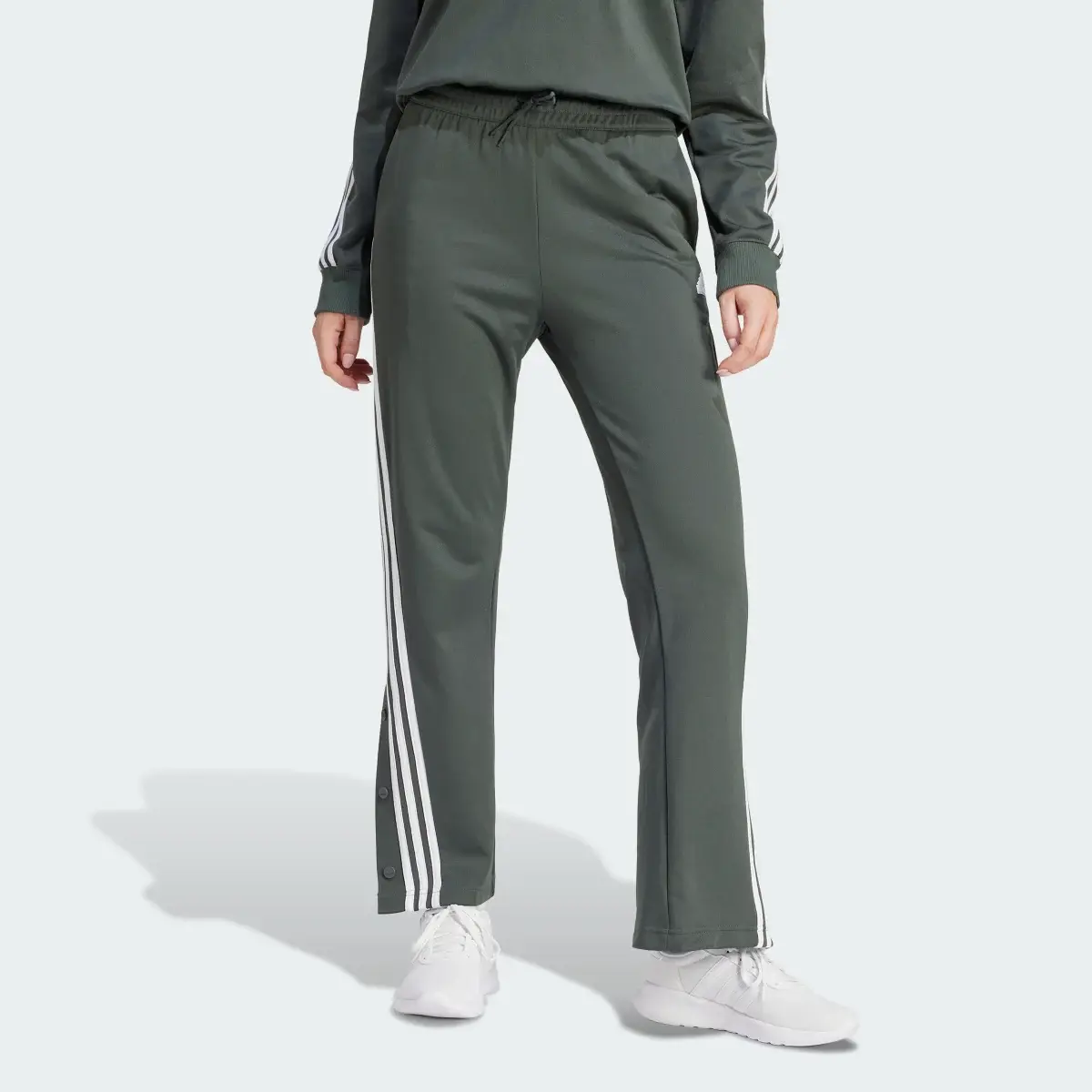 Adidas Iconic Wrapping 3-Stripes Snap Trackpant. 1