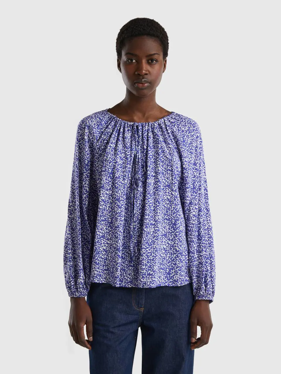 Benetton patterned blouse with laces. 1