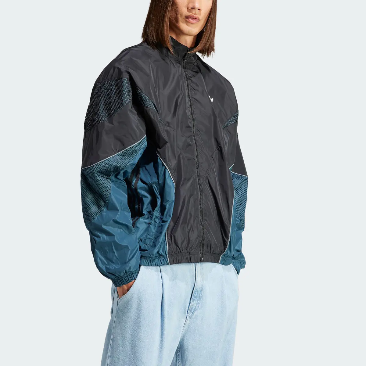 Adidas Rekive Woven Track Top. 1