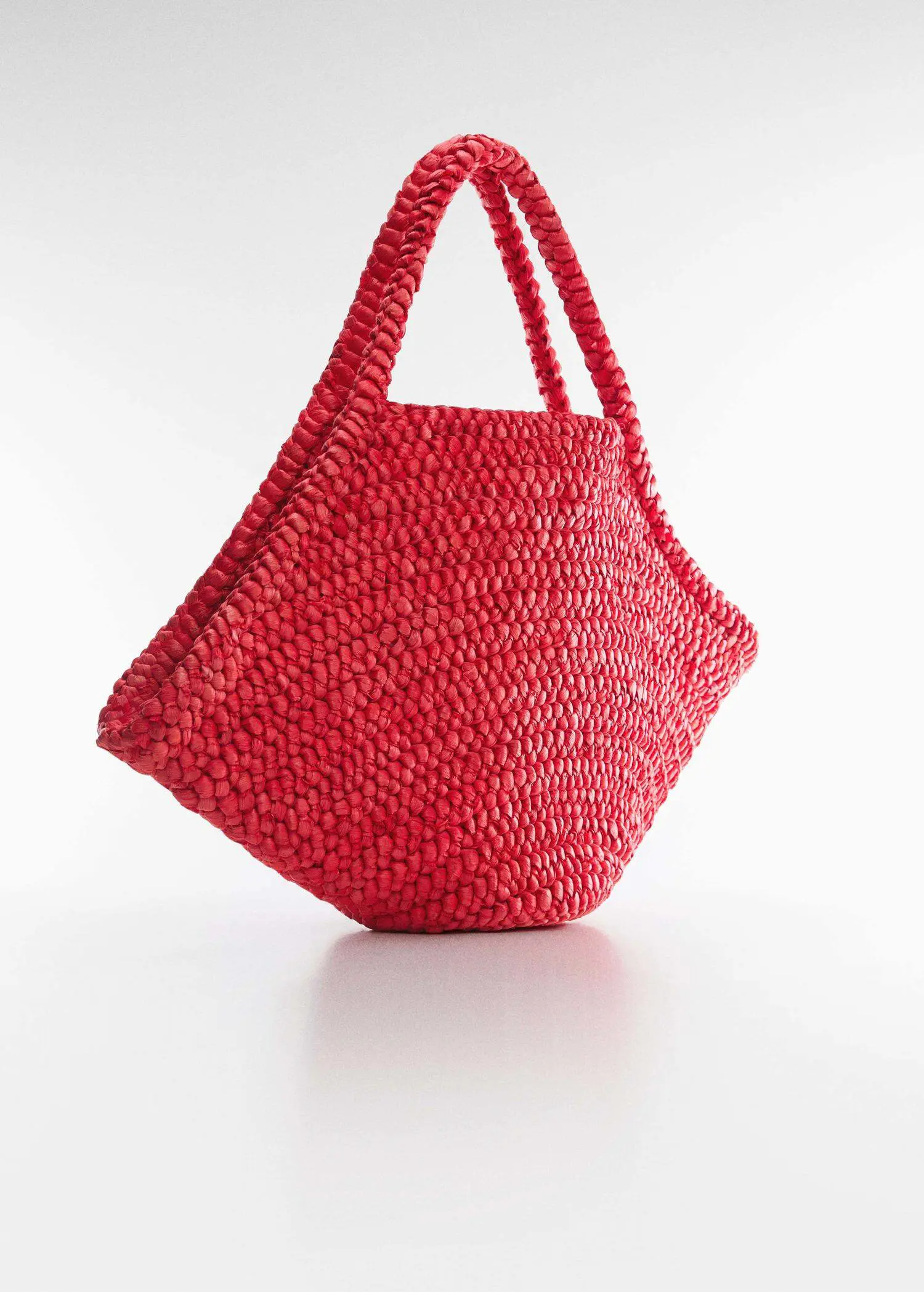 Mango Natural fiber maxi tote bag. a close up of a red bag on a white surface 