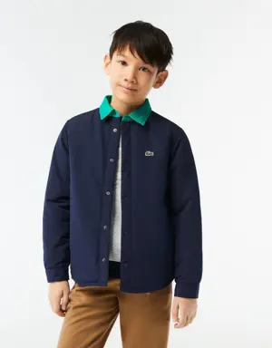 Camisa de tafetá impermeável com colarinho em contraste Lacoste para menino