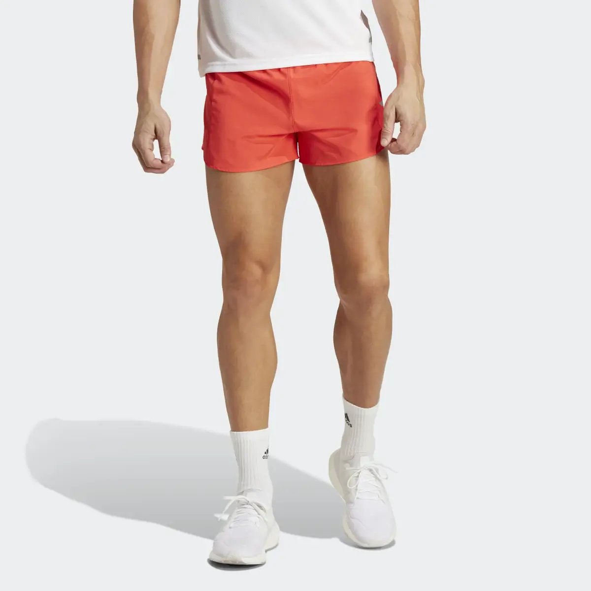 Adidas Own the Run Split Shorts. 1