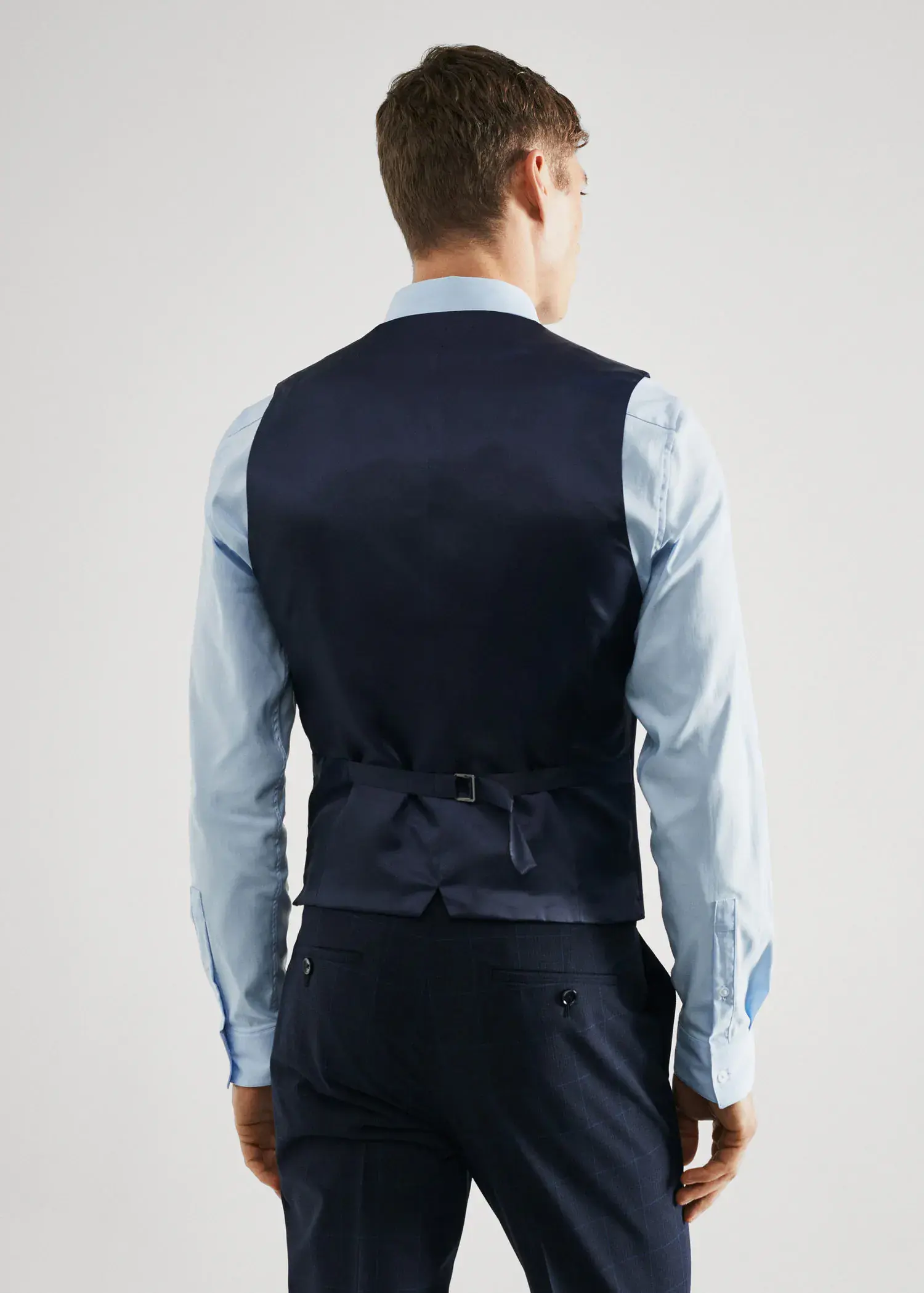 Mango Super slim-fit check suit waistcoat. a man wearing a suit and a vest. 