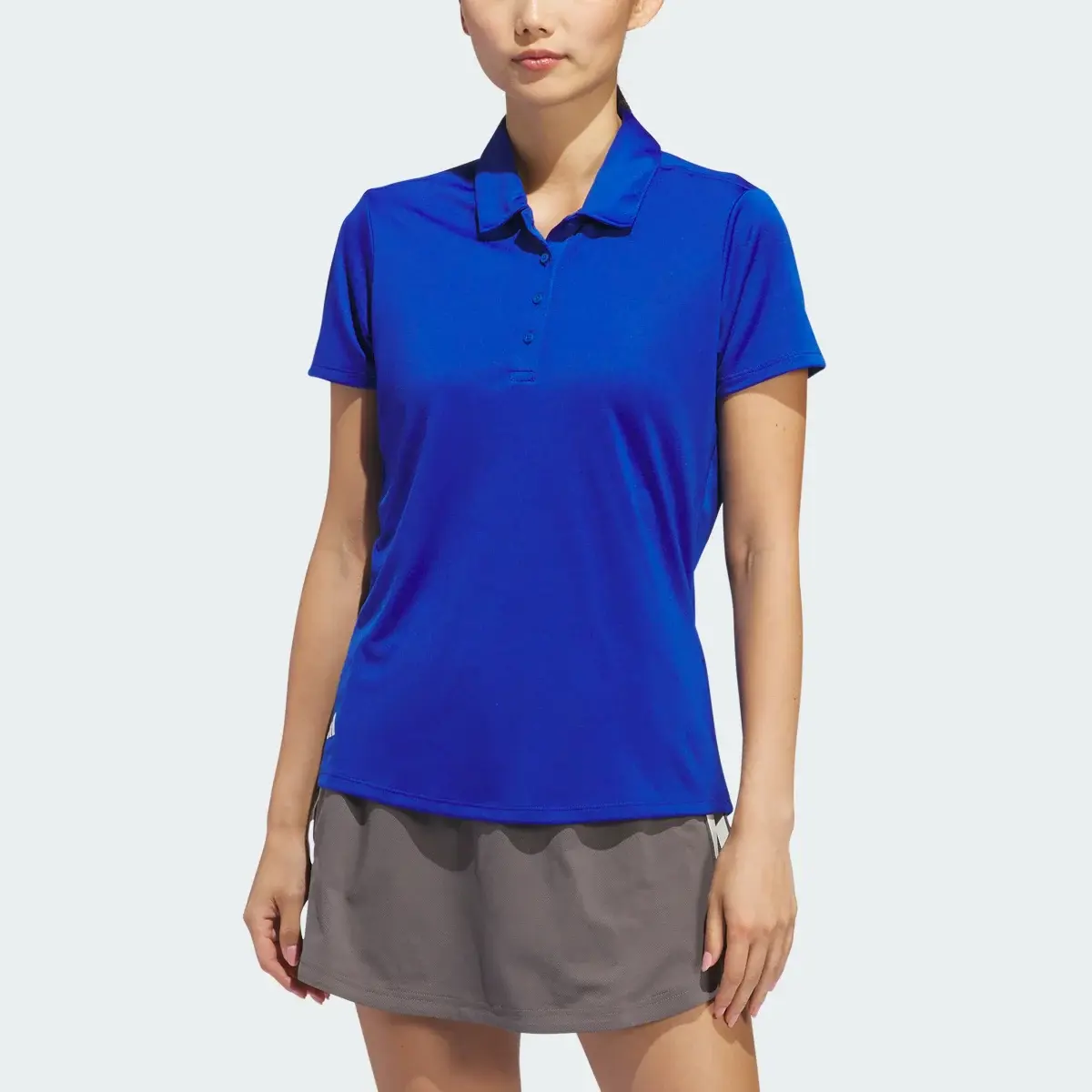 Adidas Women's Solid Performance Short Sleeve Polo Shirt. 1