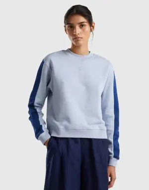 sky blue sweatshirt with dark blue band
