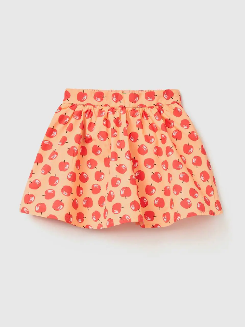 Benetton pink skirt with apple pattern. 1
