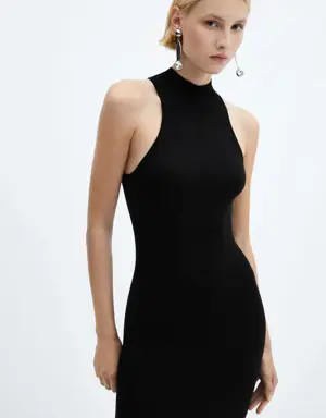 Fitted dress with back slit
