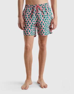 pink swim trunks with pear pattern