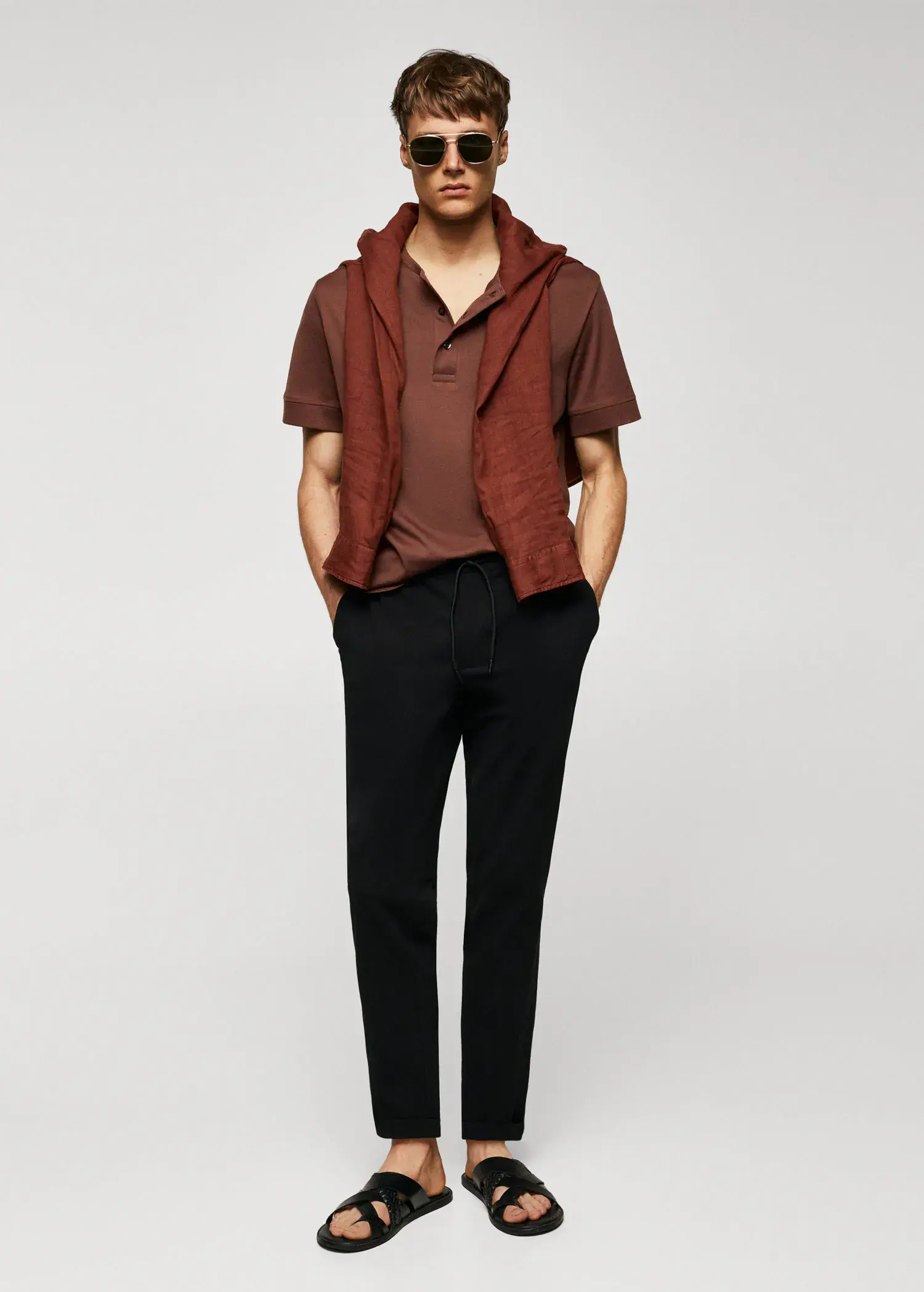 Mango Cotton seersucker pants with drawstring . a man in a brown shirt and a brown vest. 