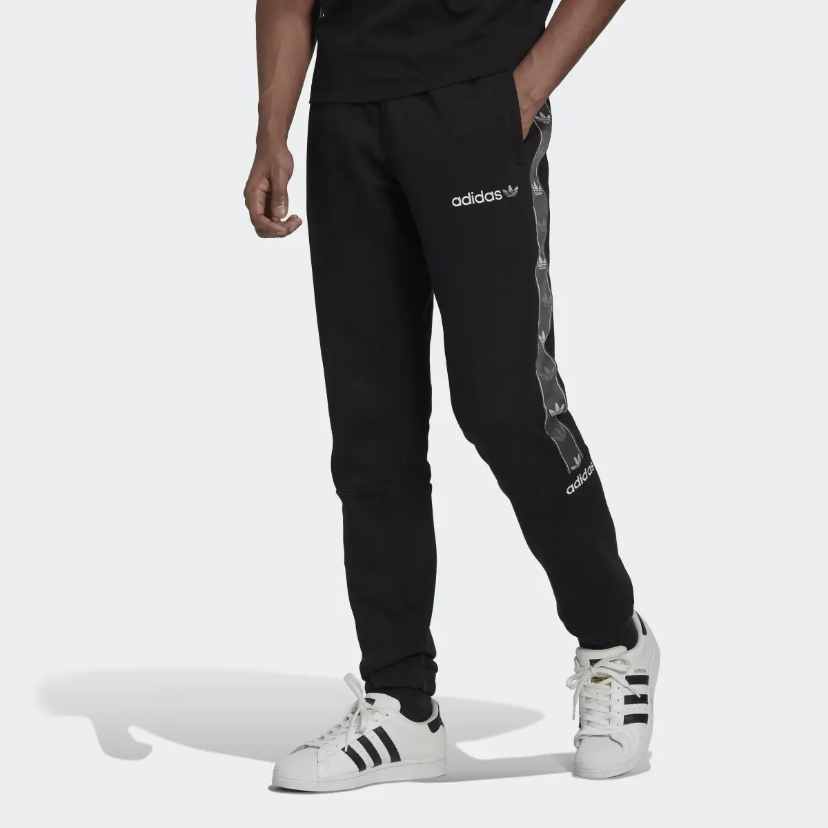 Adidas Pantalon molleton Tape. 1