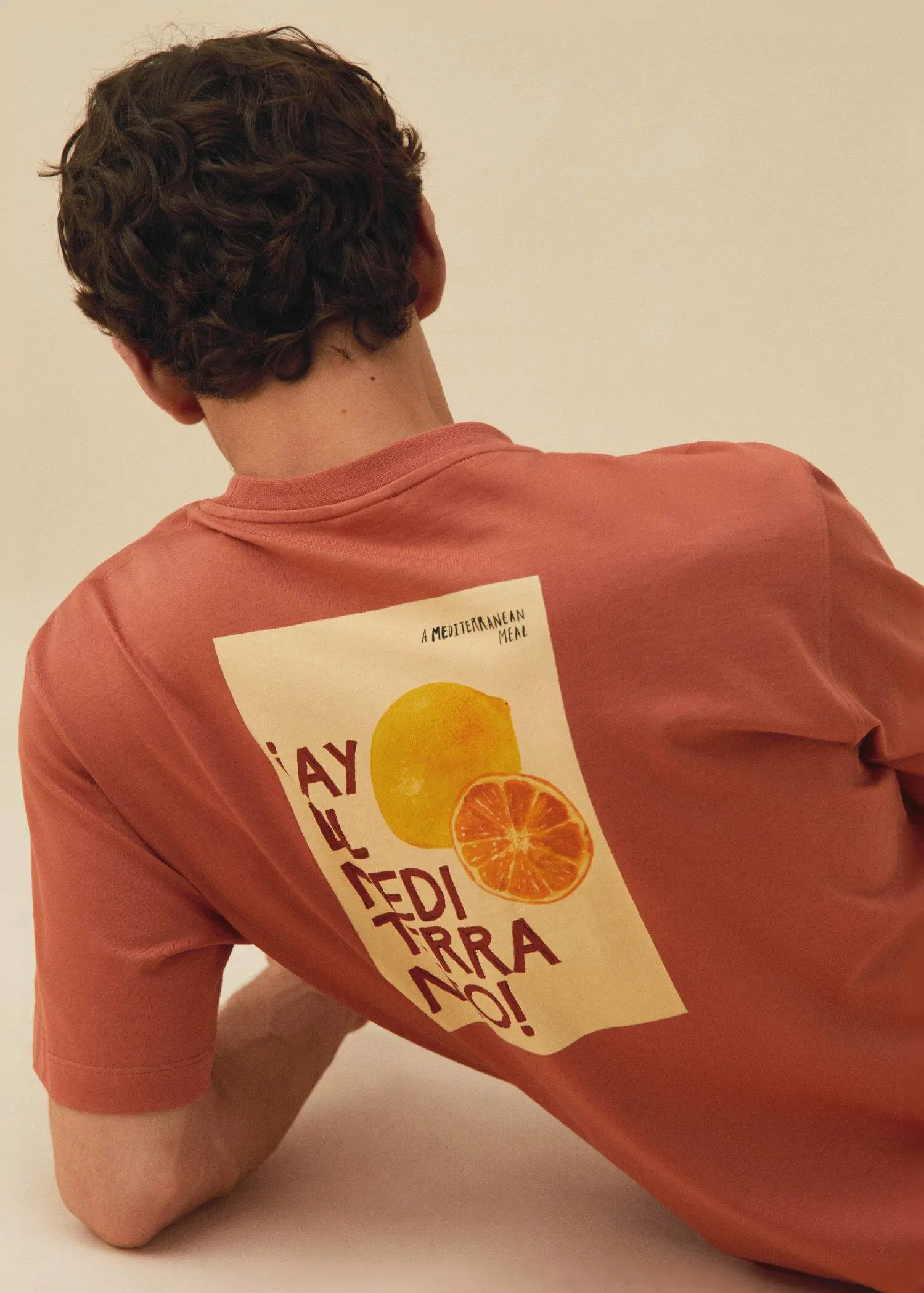 Mango Adriana Eskenazi x Mango t-shirt. a person wearing a t-shirt with a picture of an orange. 