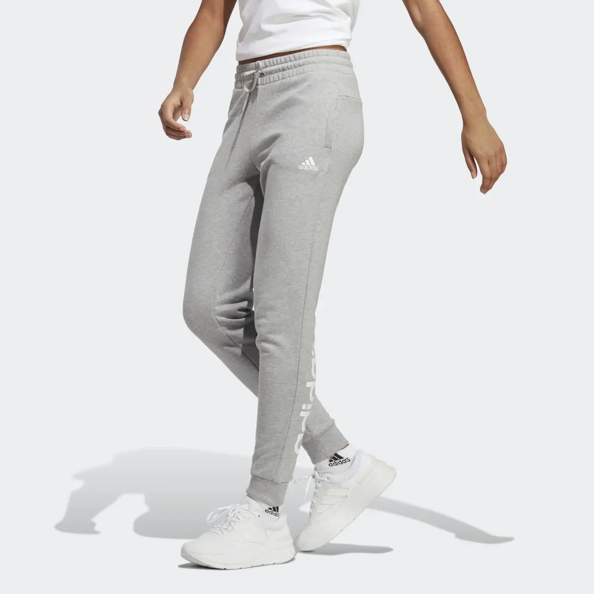 Adidas Pantalon en molleton à chevilles élastiques Essentials Linear. 1