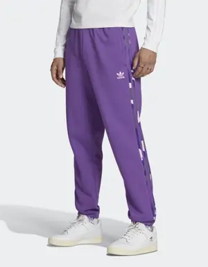 Adidas Pantalon de survêtement graphique à motif camouflage