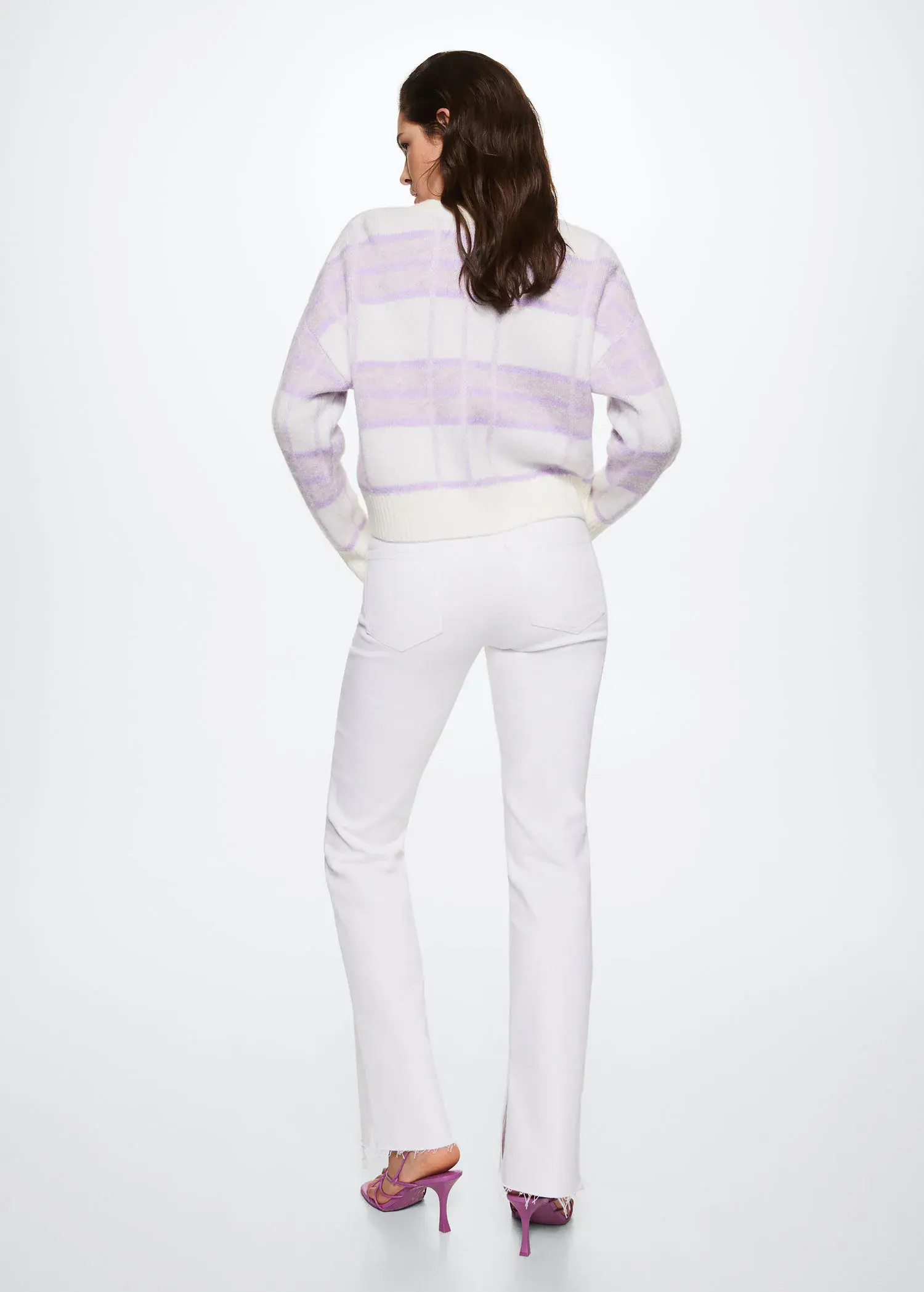 Mango Check knitted cardigan. a woman wearing white pants and a purple sweater. 