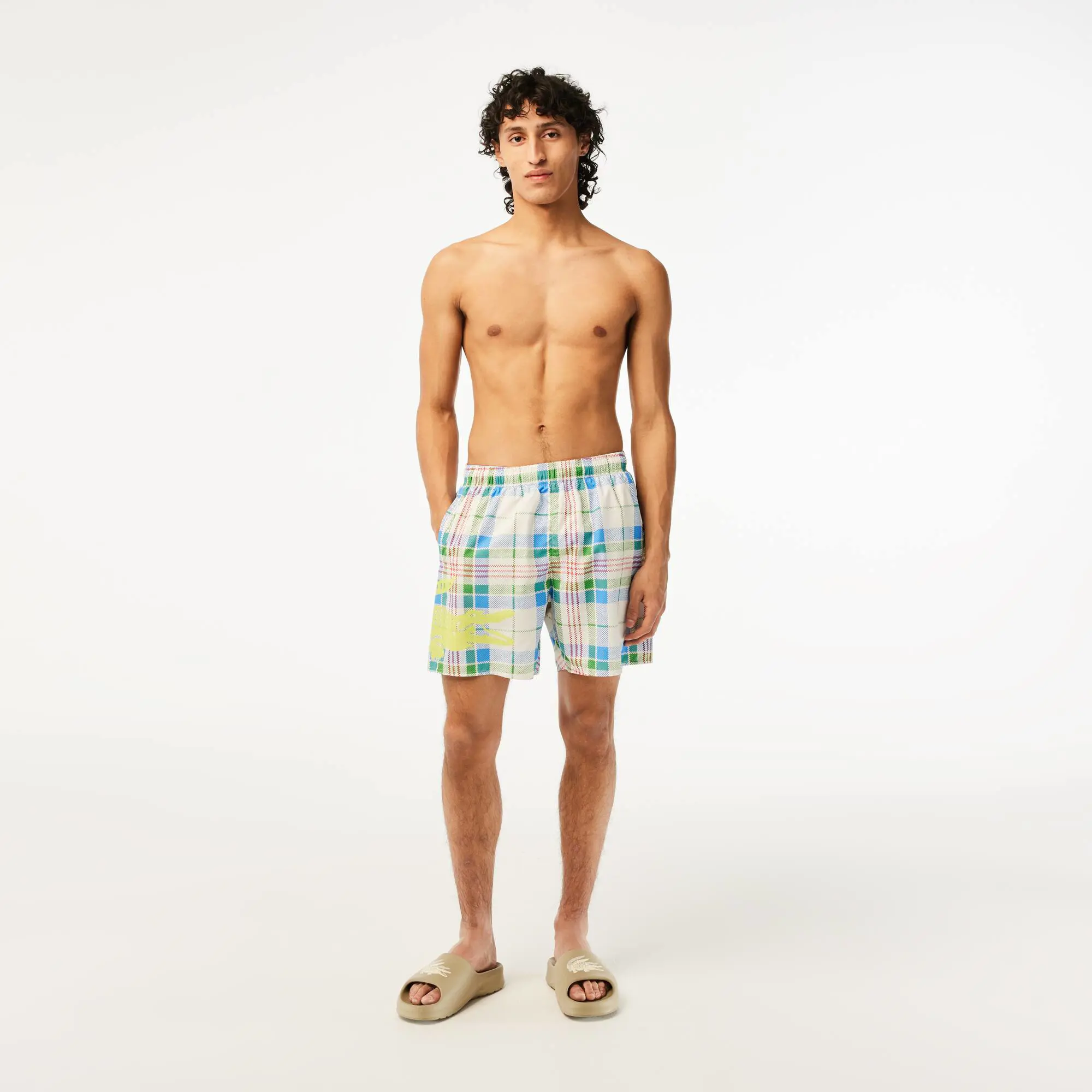 Lacoste Men’s Quick-Dry Checked Swim Trunks. 1